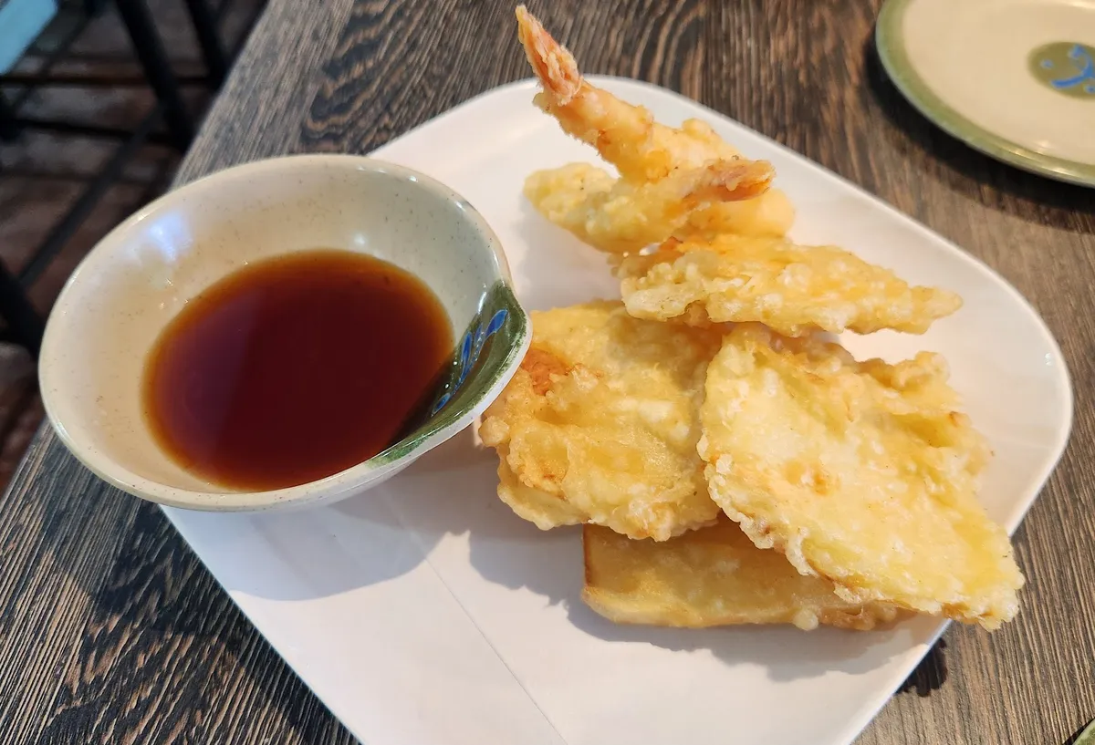 Plate of tempura with a side of dipping sauce